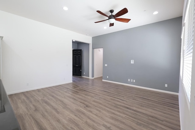 879 Hermosa Ave, Clovis, CA 93619 - empty room with a ceiling fan, wood finished floors, and recessed lighting
