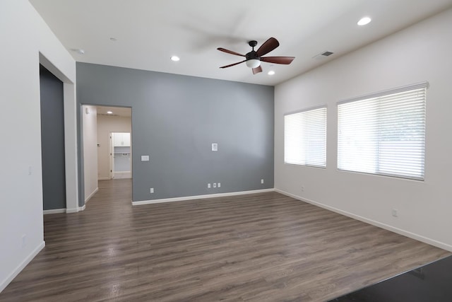 879 Hermosa Ave, Clovis, CA 93619 - unfurnished room with a ceiling fan, recessed lighting, and dark wood-style flooring