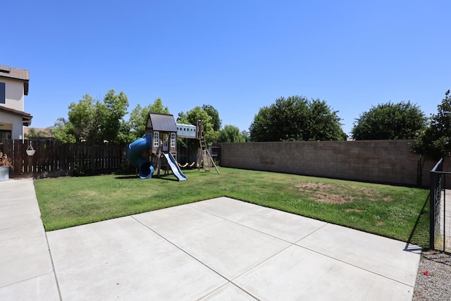 879 Hermosa Ave, Clovis, CA 93619 - fenced backyard featuring a playground and a patio area