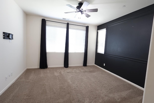 879 Hermosa Ave, Clovis, CA 93619 - unfurnished room with a ceiling fan and light colored carpet