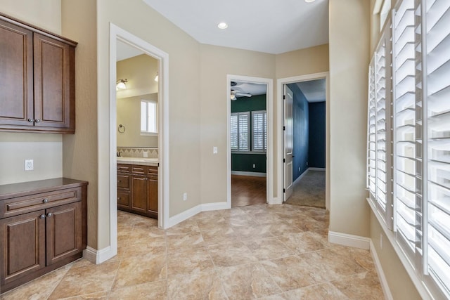 5857 W Modoc, Visalia, CA 93291 - corridor featuring light tile patterned flooring