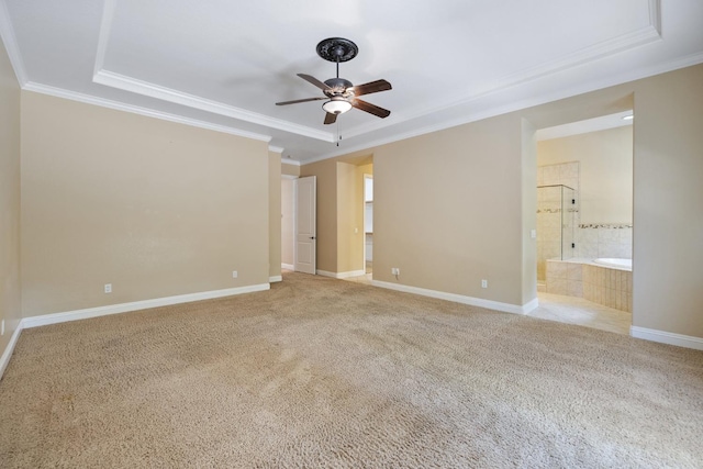 5857 W Modoc, Visalia, CA 93291 - carpeted empty room with a tray ceiling, ornamental molding, and a ceiling fan