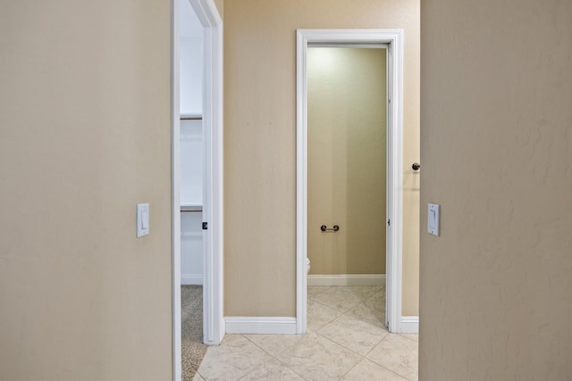 5857 W Modoc, Visalia, CA 93291 - hall with light tile patterned floors and baseboards