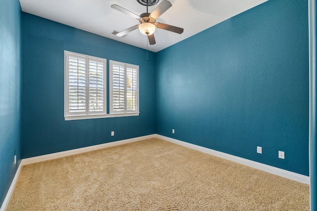 5857 W Modoc, Visalia, CA 93291 - spare room featuring a ceiling fan and carpet floors