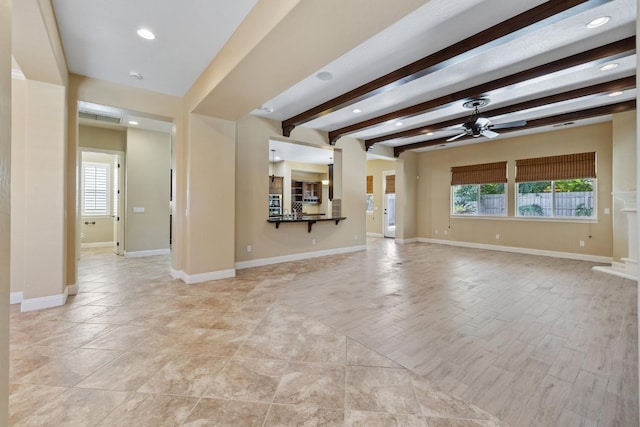 5857 W Modoc, Visalia, CA 93291 - unfurnished living room with a ceiling fan, beam ceiling, and recessed lighting