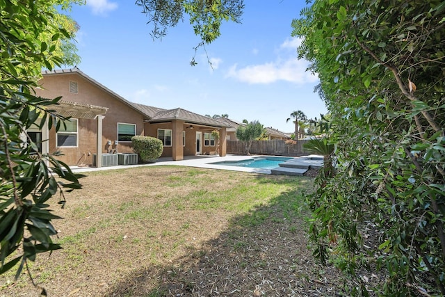 5857 W Modoc, Visalia, CA 93291 - fenced backyard featuring a pergola, a ceiling fan, and a patio area