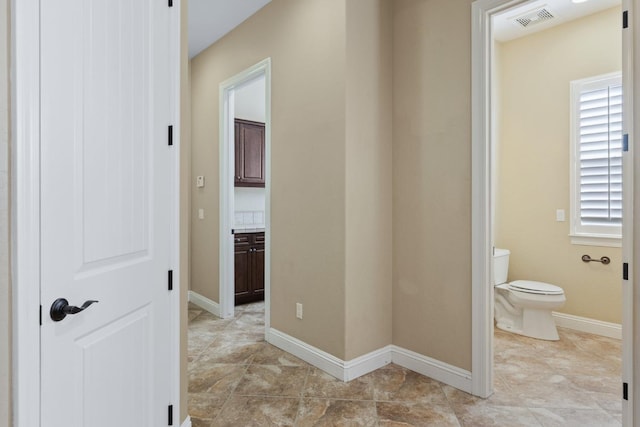 5857 W Modoc, Visalia, CA 93291 - hall with light tile patterned flooring