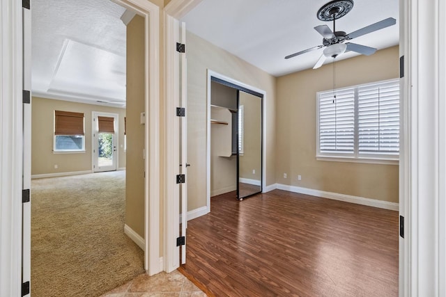 5857 W Modoc, Visalia, CA 93291 - unfurnished bedroom featuring wood finished floors and a ceiling fan