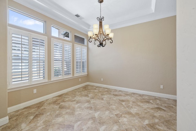 5857 W Modoc, Visalia, CA 93291 - unfurnished room with healthy amount of natural light, a chandelier, a raised ceiling, and crown molding