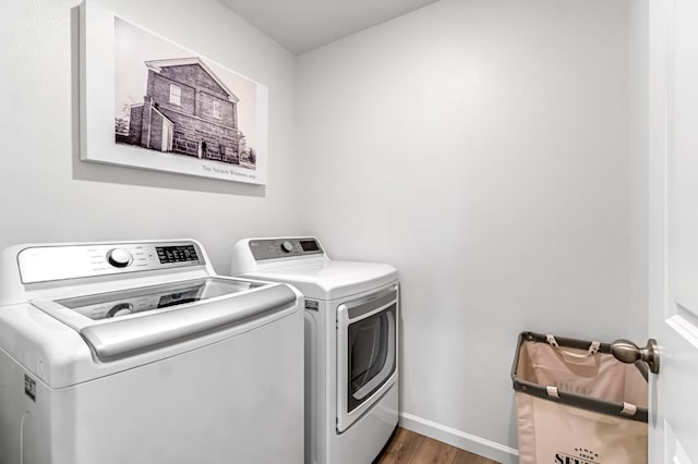 4086 Dennis Ave, Clovis, CA 93619 - laundry area featuring washer and clothes dryer and wood finished floors
