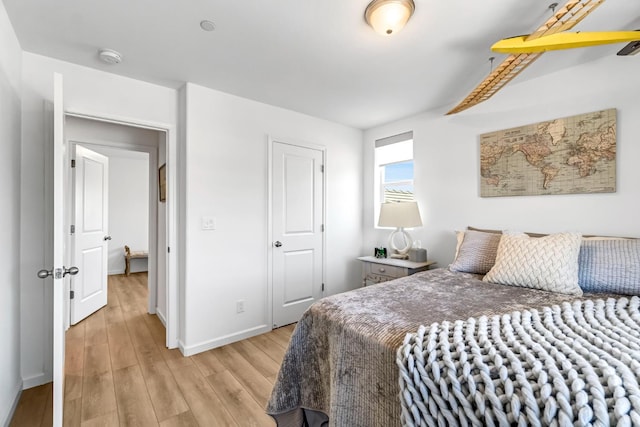 4086 Dennis Ave, Clovis, CA 93619 - bedroom with light wood finished floors and baseboards