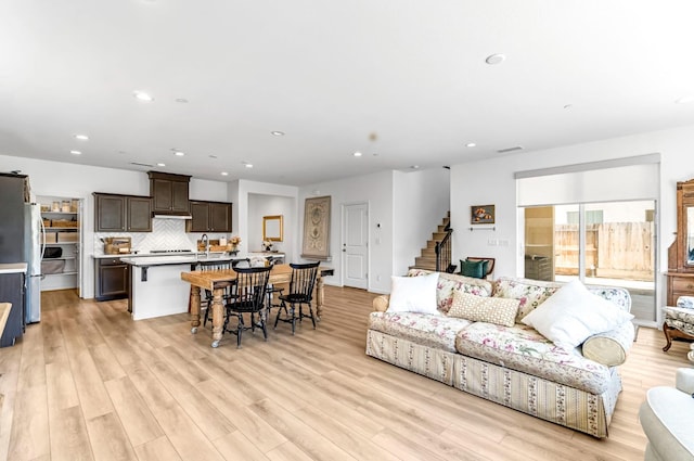 4086 Dennis Ave, Clovis, CA 93619 - living area with recessed lighting, light wood-style flooring, and stairs