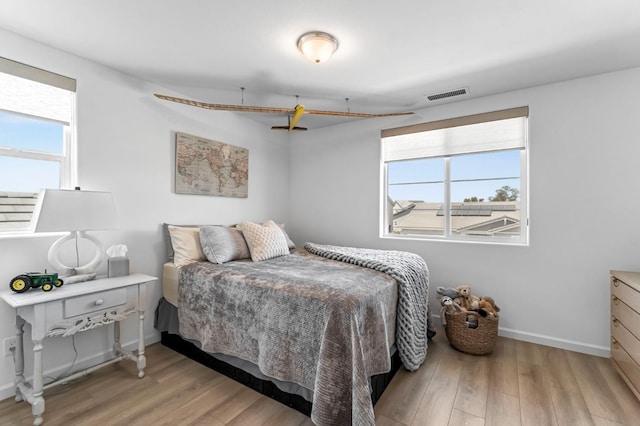 4086 Dennis Ave, Clovis, CA 93619 - bedroom featuring wood finished floors and baseboards