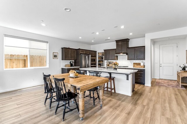 4086 Dennis Ave, Clovis, CA 93619 - dining area featuring light wood finished floors and recessed lighting