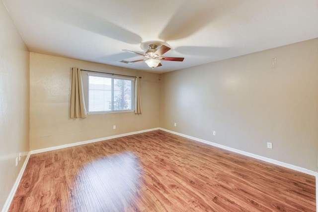 564 S Duke Ave, Fresno, CA 93727 - spare room featuring a ceiling fan and light wood-type flooring