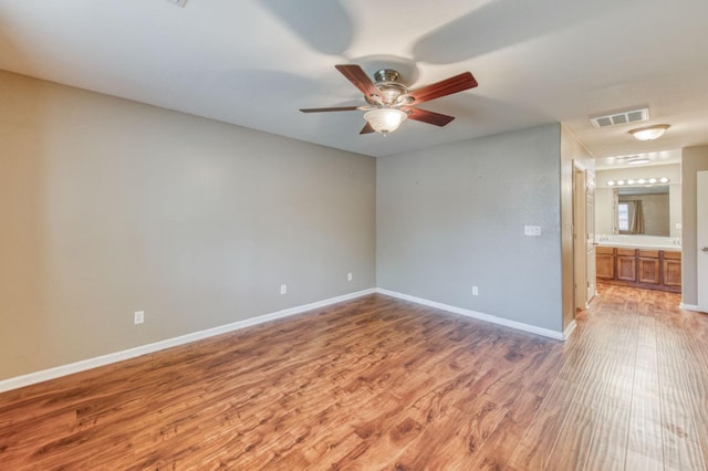 564 S Duke Ave, Fresno, CA 93727 - spare room with light wood-type flooring and ceiling fan