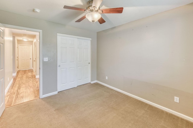 564 S Duke Ave, Fresno, CA 93727 - unfurnished bedroom with light carpet, a closet, and ceiling fan