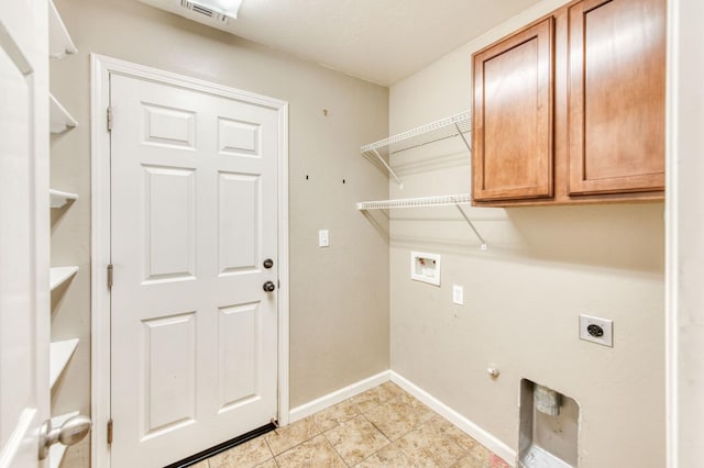 564 S Duke Ave, Fresno, CA 93727 - washroom with cabinet space, electric dryer hookup, washer hookup, gas dryer hookup, and light tile patterned floors