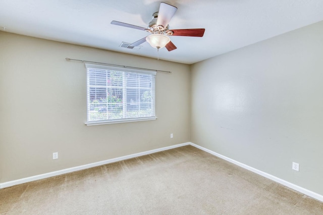 564 S Duke Ave, Fresno, CA 93727 - carpeted spare room featuring baseboards and ceiling fan