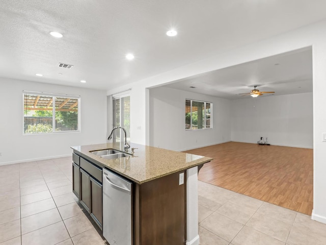 3807 N Pearwood Ave, Fresno, CA 93727 - kitchen featuring dishwasher, light tile patterned flooring, plenty of natural light, open floor plan, and recessed lighting