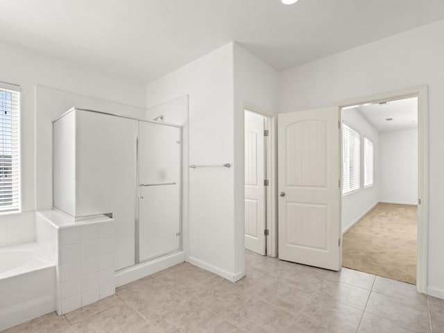3807 N Pearwood Ave, Fresno, CA 93727 - unfurnished bedroom featuring light tile patterned floors and light carpet