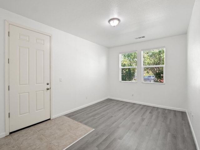 3807 N Pearwood Ave, Fresno, CA 93727 - empty room with wood finished floors and baseboards