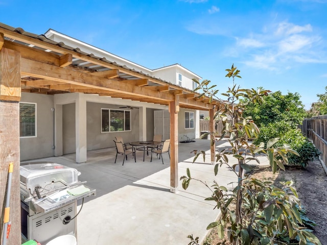 3807 N Pearwood Ave, Fresno, CA 93727 - fenced backyard with a patio, outdoor dining area, and area for grilling