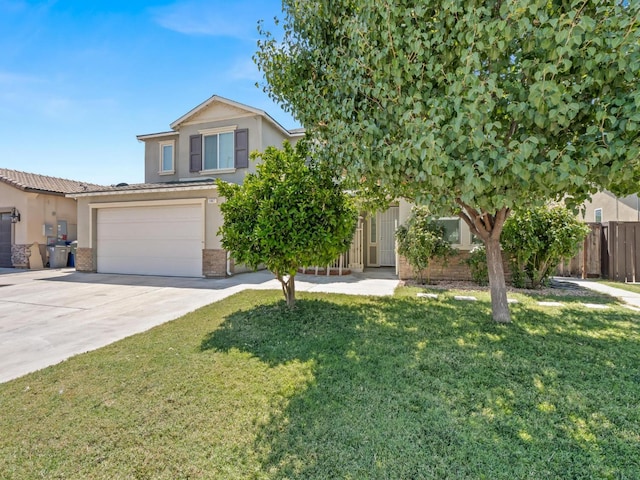 3807 N Pearwood Ave, Fresno, CA 93727 - view of front of house featuring stucco siding, concrete driveway, a garage, and brick siding