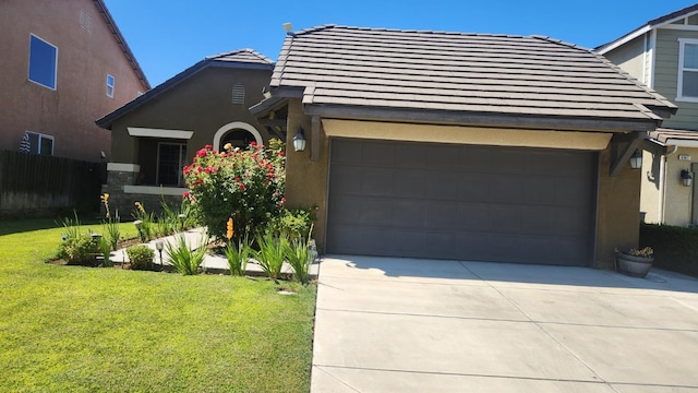 6575 E Cetti Ave E, Fresno, CA 93727 - view of front of property with concrete driveway, a tiled roof, stucco siding, and an attached garage