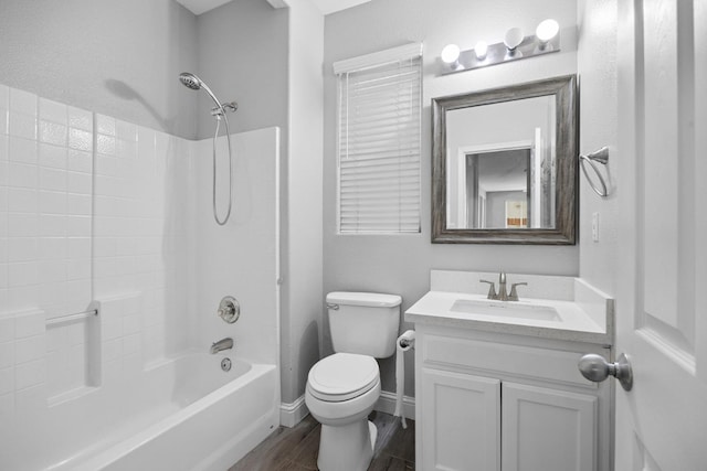 2720 San Jose Ave, Clovis, CA 93611 - bathroom featuring vanity, tub / shower combination, and wood finished floors