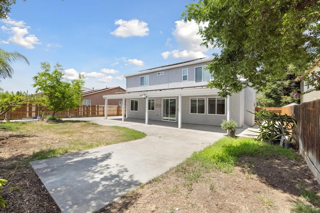 2720 San Jose Ave, Clovis, CA 93611 - rear view of house featuring a patio, stucco siding, and a fenced backyard