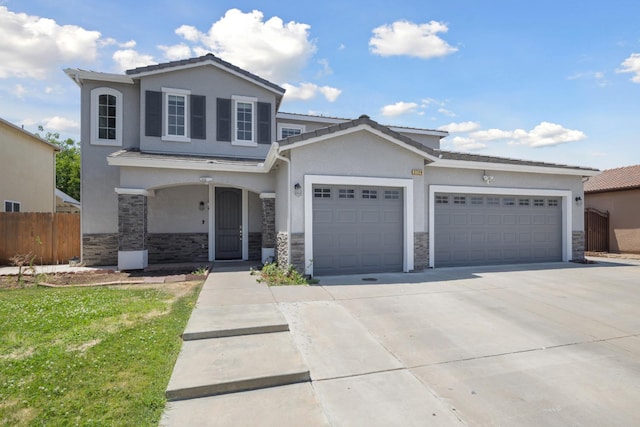 2720 San Jose Ave, Clovis, CA 93611 - traditional-style home with stone siding, stucco siding, a garage, and driveway