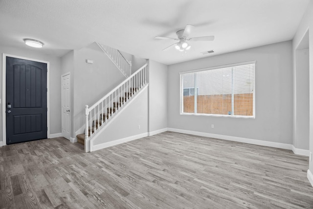 2720 San Jose Ave, Clovis, CA 93611 - entryway with stairway, a ceiling fan, and wood finished floors