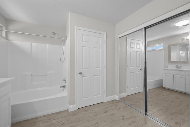 2720 San Jose Ave, Clovis, CA 93611 - full bath with vanity, wood finished floors, and  shower combination
