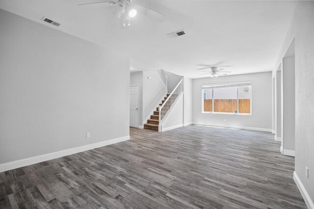 2720 San Jose Ave, Clovis, CA 93611 - unfurnished living room with a ceiling fan, stairs, and wood finished floors