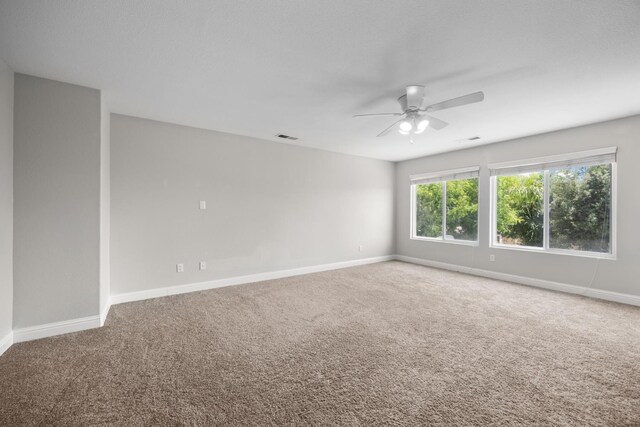 2720 San Jose Ave, Clovis, CA 93611 - carpeted empty room with a ceiling fan and baseboards
