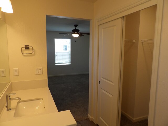 3725 Graystoke Way, Clovis, CA 93619 - bathroom with vanity, a ceiling fan, and a walk in closet