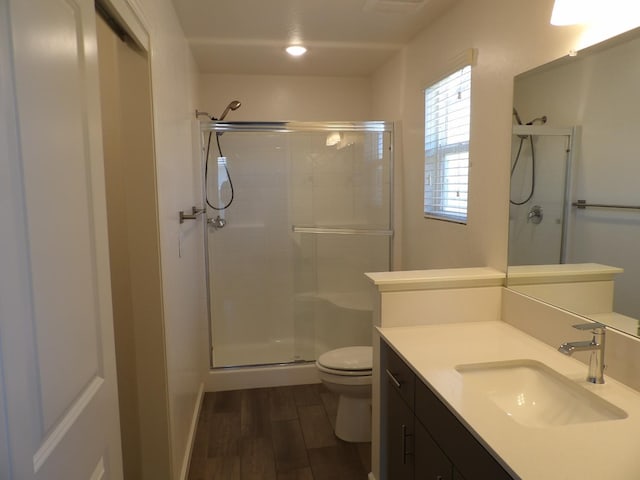 3725 Graystoke Way, Clovis, CA 93619 - bathroom with a stall shower, wood finished floors, and vanity