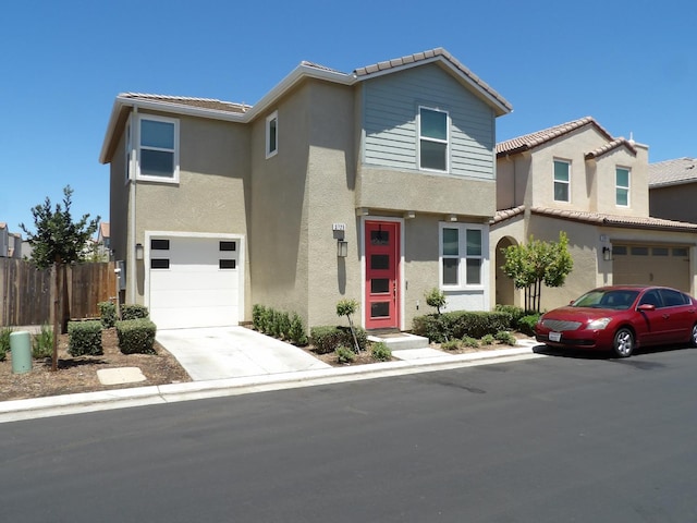 3725 Graystoke Way, Clovis, CA 93619 - townhome / multi-family property with an attached garage, stucco siding, driveway, and a tile roof
