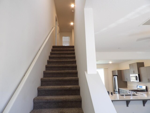 3725 Graystoke Way, Clovis, CA 93619 - stairs featuring recessed lighting