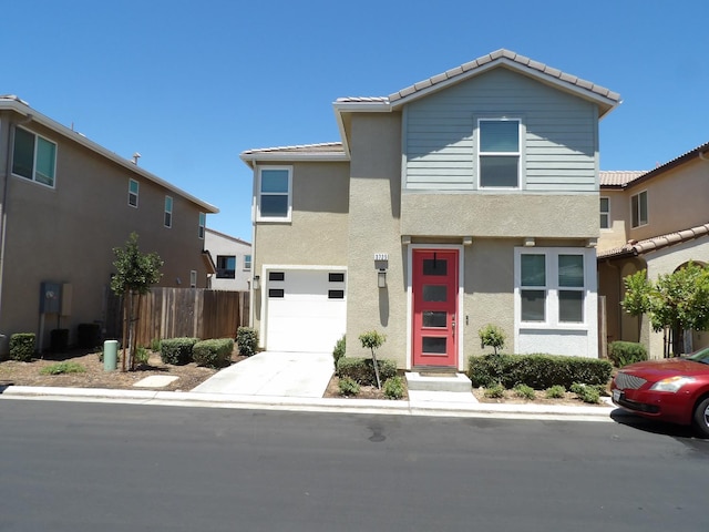 3725 Graystoke Way, Clovis, CA 93619 - townhome / multi-family property with a garage, a tiled roof, stucco siding, and concrete driveway