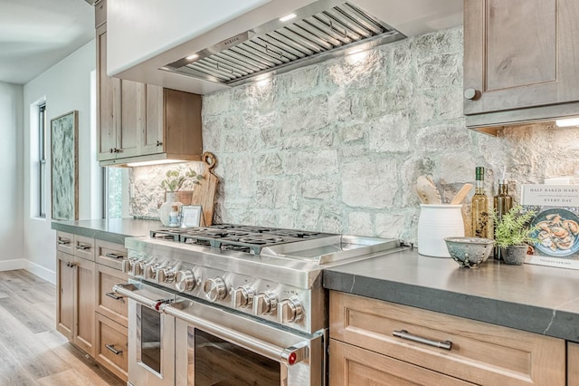 42732 Granite Cir, Shaver Lake, CA 93664 - kitchen with double oven range, custom range hood, tasteful backsplash, and light wood-type flooring