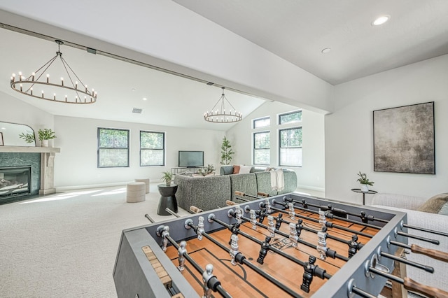 42732 Granite Cir, Shaver Lake, CA 93664 - recreation room featuring a chandelier, vaulted ceiling, carpet flooring, a fireplace, and recessed lighting