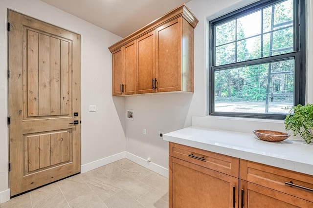 42732 Granite Cir, Shaver Lake, CA 93664 - laundry area featuring hookup for an electric dryer, hookup for a washing machine, and cabinet space