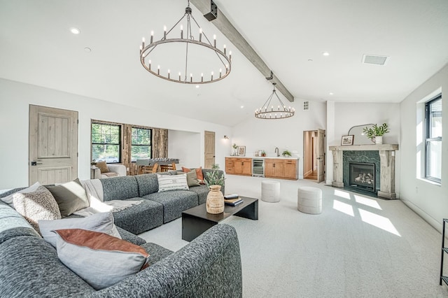 42732 Granite Cir, Shaver Lake, CA 93664 - living area featuring a chandelier, wine cooler, carpet, a premium fireplace, and recessed lighting