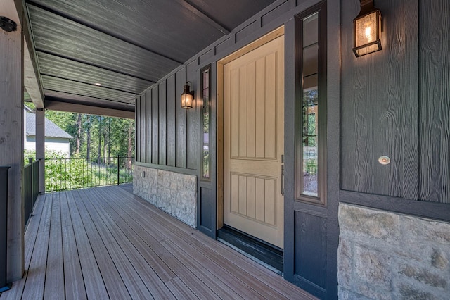 42732 Granite Cir, Shaver Lake, CA 93664 - view of exterior entry featuring stone siding and a porch