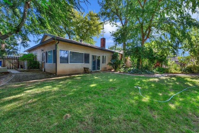 1649 W Menlo, Fresno, CA 93711 - back of house featuring stucco siding and a chimney