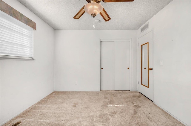 1649 W Menlo, Fresno, CA 93711 - unfurnished bedroom with carpet floors, a textured ceiling, a closet, and ceiling fan