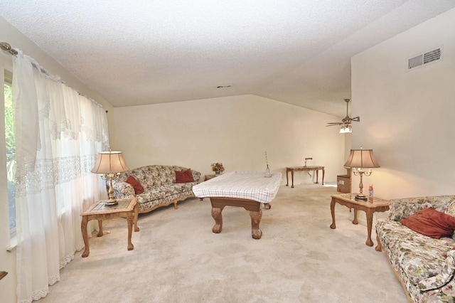 110 N Terry Ave, Clovis, CA 93612 - sitting room with carpet, vaulted ceiling, a ceiling fan, and a textured ceiling