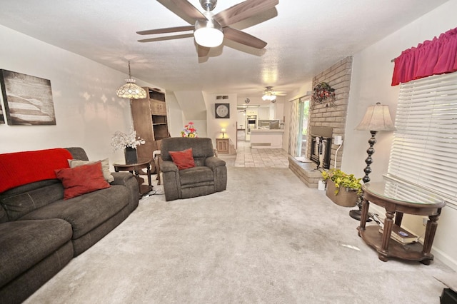 110 N Terry Ave, Clovis, CA 93612 - living room featuring ceiling fan, carpet floors, and a brick fireplace